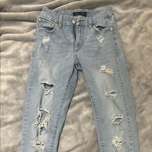 Distressed Light Wash Denim Jeans